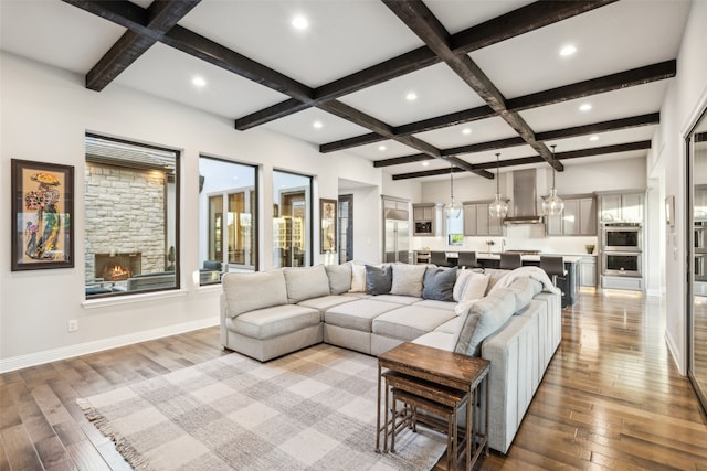 781 Star Meadow Dr, Prosper, TX 75078 - living room featuring beamed ceiling, light wood-type flooring, and coffered ceiling