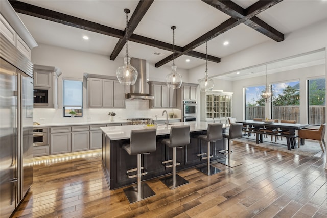 781 Star Meadow Dr, Prosper, TX 75078 - kitchen with beamed ceiling, light countertops, backsplash, and stainless steel appliances