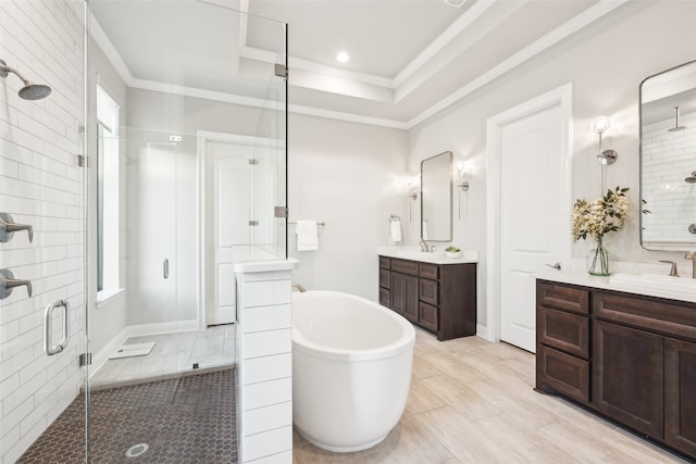 781 Star Meadow Dr, Prosper, TX 75078 - full bathroom featuring a freestanding bath, plenty of natural light, a sink, crown molding, and a stall shower