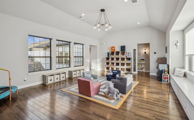 781 Star Meadow Dr, Prosper, TX 75078 - living room featuring baseboards, vaulted ceiling, a chandelier, visible vents, and wood-type flooring