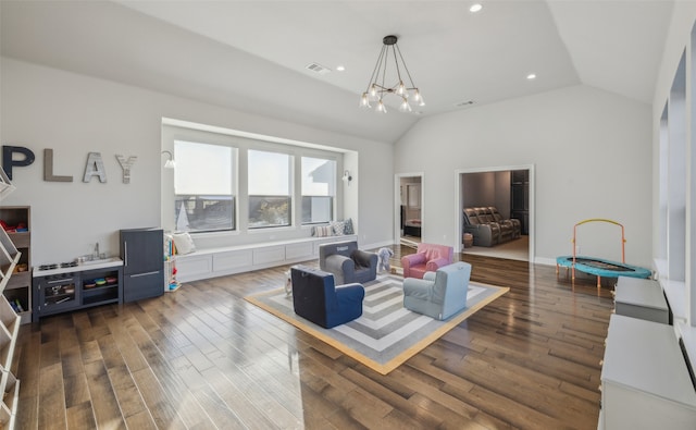 781 Star Meadow Dr, Prosper, TX 75078 - living room featuring an inviting chandelier, visible vents, recessed lighting, vaulted ceiling, and dark wood-style flooring