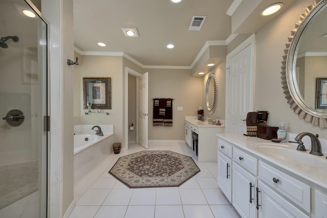 bathroom featuring a garden tub, two vanities, a shower stall, ornamental molding, and a sink