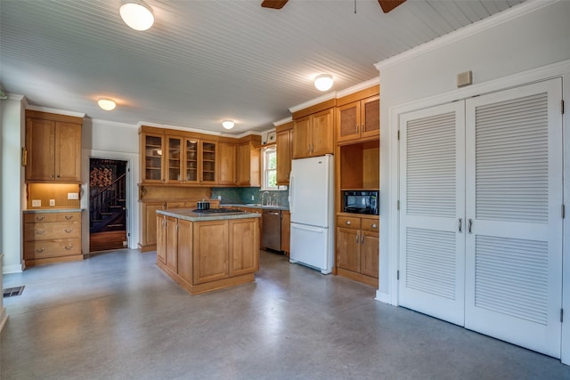 401 Pacific Ave, Terrell, TX 75160 - kitchen with tasteful backsplash, concrete floors, freestanding refrigerator, and crown molding