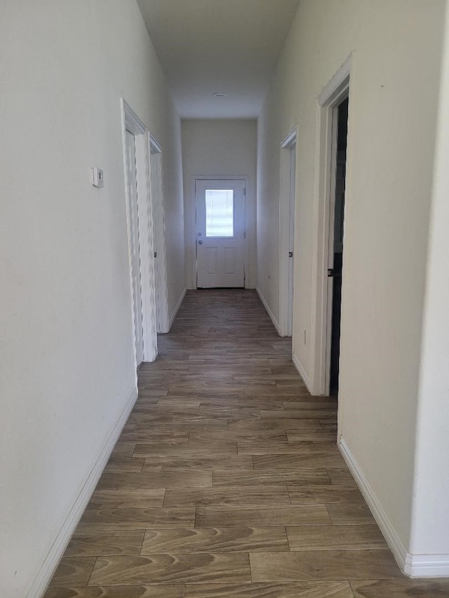 14247 Greenhaw Ln, Dallas, TX 75253 - hall featuring baseboards and wood finished floors