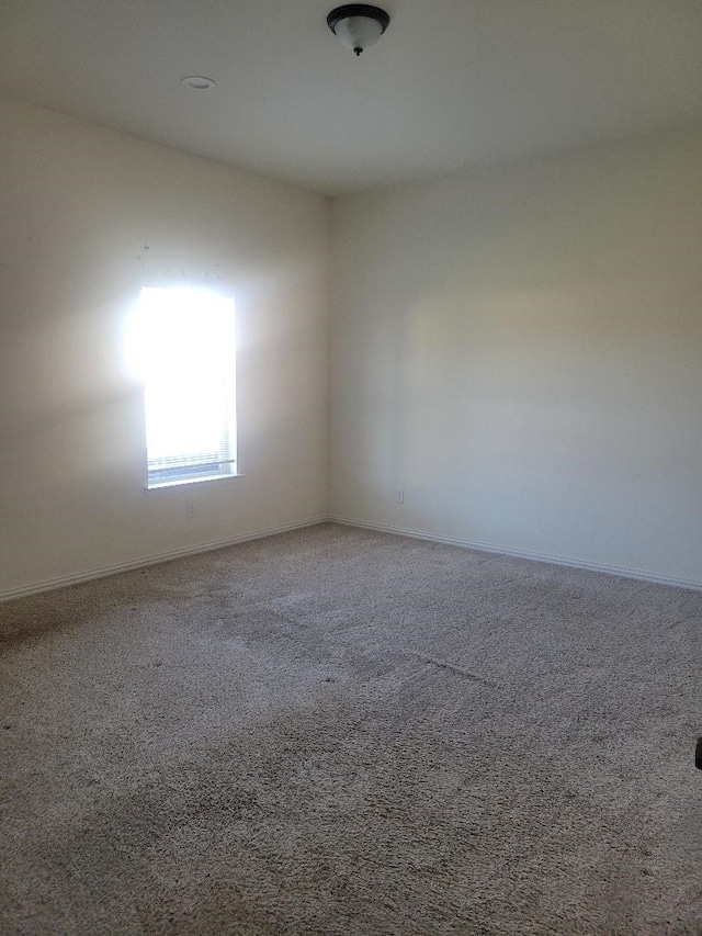 14247 Greenhaw Ln, Dallas, TX 75253 - empty room featuring carpet flooring and baseboards