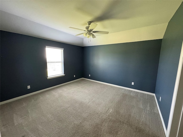 3409 Sandstone Dr, Sherman, TX 75092 - spare room featuring a ceiling fan and carpet