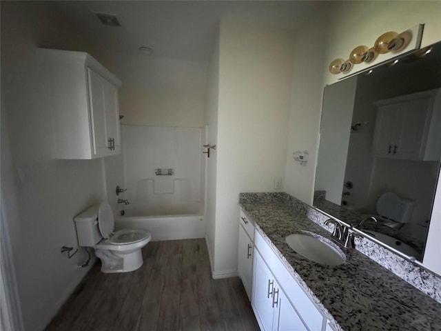 3409 Sandstone Dr, Sherman, TX 75092 - full bath featuring wood finished floors, vanity, and shower / bathtub combination