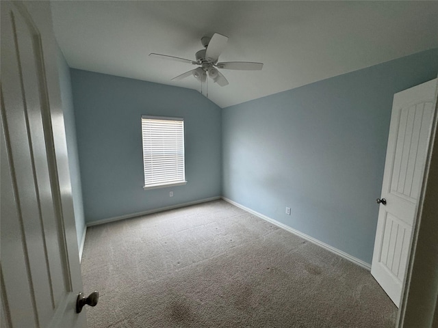 3409 Sandstone Dr, Sherman, TX 75092 - empty room featuring ceiling fan, carpet floors, and vaulted ceiling