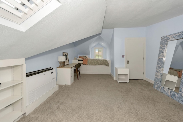 bedroom featuring baseboards, vaulted ceiling, and light colored carpet