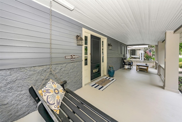 view of patio featuring covered porch