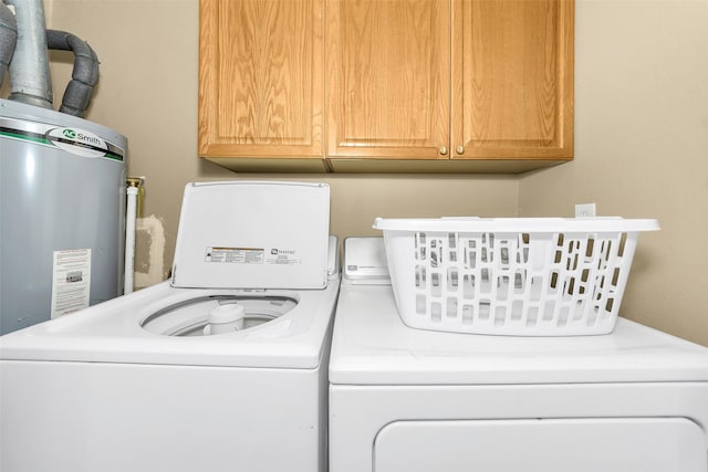 washroom featuring washer and clothes dryer