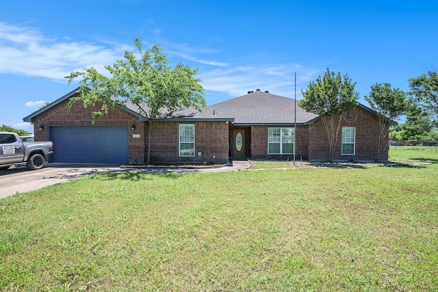 ranch-style home with a front lawn, driveway, brick siding, and an attached garage