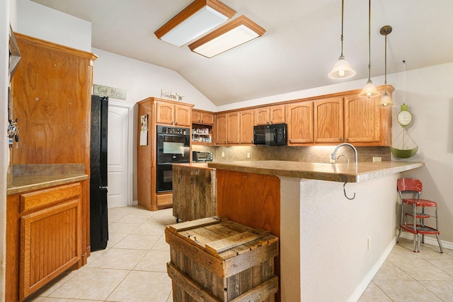 kitchen featuring light tile patterned floors, black appliances, a peninsula, and decorative backsplash