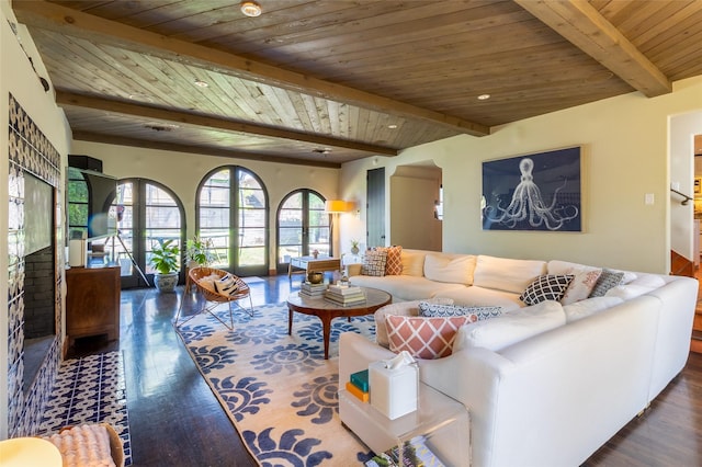 living area with recessed lighting, wood ceiling, beamed ceiling, and wood finished floors
