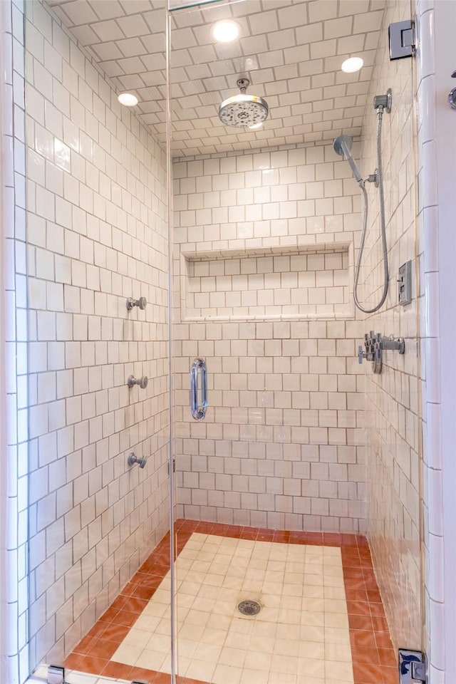 full bathroom with a shower stall, tile patterned flooring, and recessed lighting