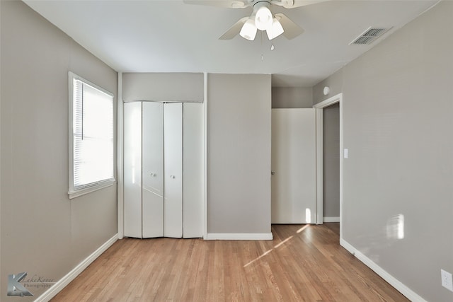4158 Russell Ave, Abilene, TX 79605 - unfurnished bedroom with light wood-style floors, visible vents, baseboards, and a closet