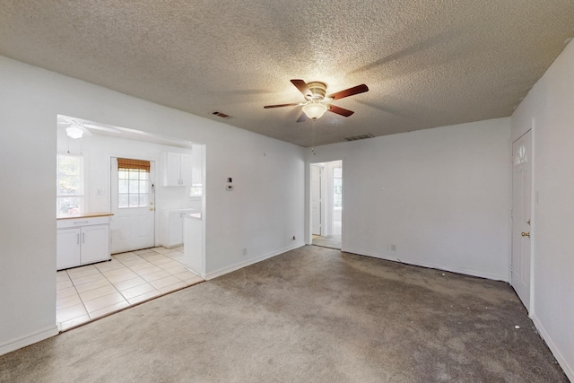 full bath with an enclosed shower, toilet, vanity, and tile patterned floors