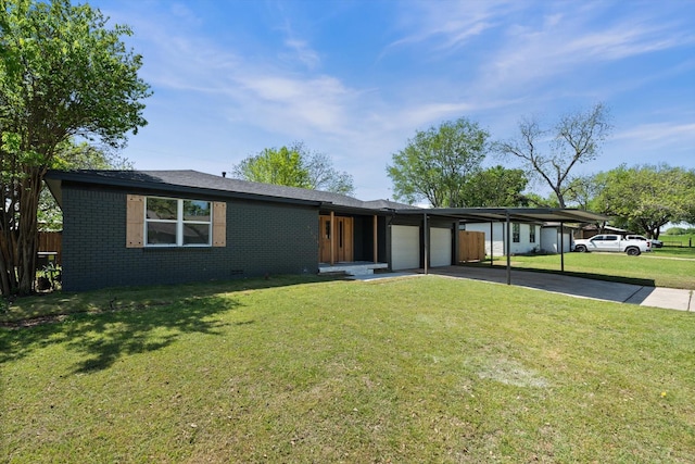 view of front of house with a front yard, an attached garage, fence, brick siding, and driveway