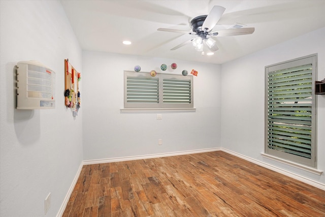 813 Grinnell Dr, Richardson, TX 75081 - spare room with wood finished floors, baseboards, a ceiling fan, and recessed lighting