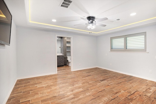 813 Grinnell Dr, Richardson, TX 75081 - unfurnished room with a raised ceiling, ceiling fan, light wood finished floors, and recessed lighting