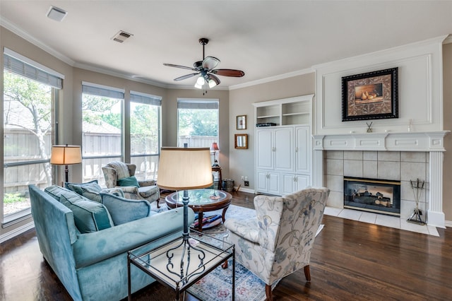 809 Lake Point Cir, Mckinney, TX 75072 - living room with wood finished floors, ceiling fan, ornamental molding, and visible vents