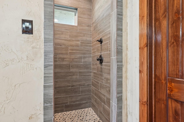 bathroom featuring a stall shower