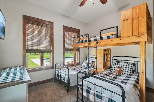 carpeted bedroom with baseboards