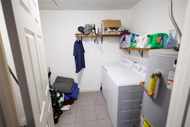8820 Guadalupe Rd, Fort Worth, TX 76116 - laundry room with water heater, tile patterned flooring, washing machine and dryer, attic access, and laundry area