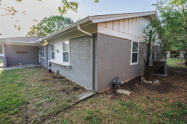 8820 Guadalupe Rd, Fort Worth, TX 76116 - view of side of property featuring central AC unit and brick siding