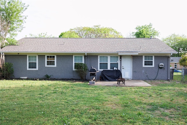 8820 Guadalupe Rd, Fort Worth, TX 76116 - back of house with a patio area, brick siding, fence, and a lawn