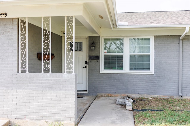 8820 Guadalupe Rd, Fort Worth, TX 76116 - property entrance featuring brick siding and a shingled roof
