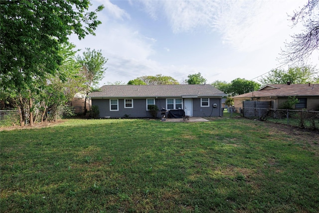 8820 Guadalupe Rd, Fort Worth, TX 76116 - back of property with a fenced backyard, a patio, and a lawn