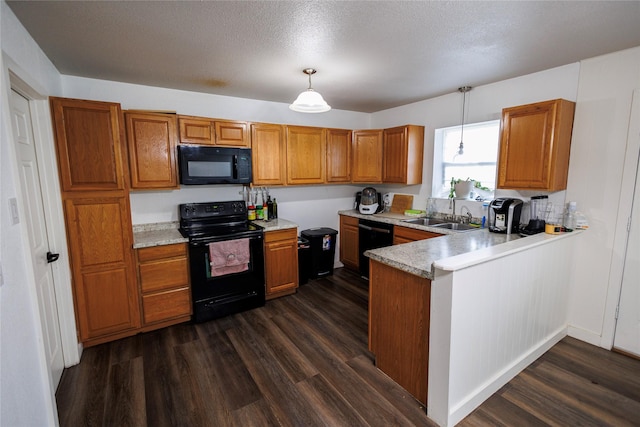 8820 Guadalupe Rd, Fort Worth, TX 76116 - kitchen with a sink, brown cabinetry, and black appliances