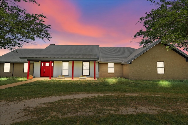 9518 County Road 913, Godley, TX 76044 - ranch-style house with a front yard and metal roof