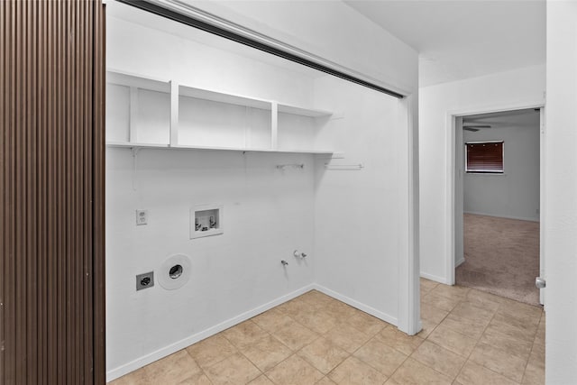 9518 County Road 913, Godley, TX 76044 - laundry room with hookup for a gas dryer, hookup for an electric dryer, washer hookup, and baseboards