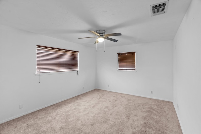 9518 County Road 913, Godley, TX 76044 - empty room with carpet, visible vents, baseboards, and ceiling fan