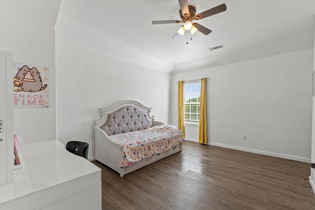 bedroom featuring visible vents, baseboards, ceiling fan, dark wood finished floors, and lofted ceiling
