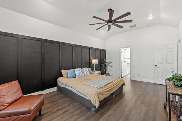 bedroom with visible vents, vaulted ceiling, a ceiling fan, and wood finished floors