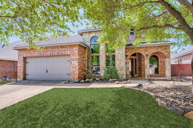 traditional-style house featuring brick siding, concrete driveway, an attached garage, and roof with shingles