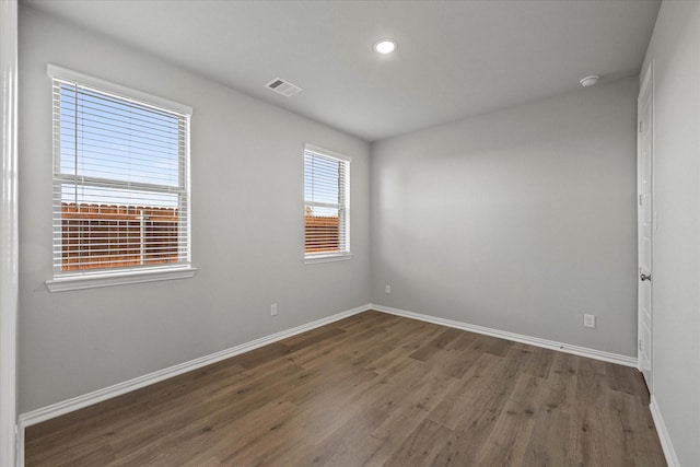 3506 Riley St, Fate, TX 75087 - unfurnished room featuring recessed lighting, wood finished floors, visible vents, and baseboards