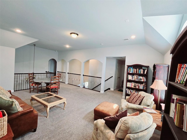 9812 El Colina Dr, Fort Worth, TX 76179 - living area with vaulted ceiling, recessed lighting, carpet flooring, visible vents, and arched walkways