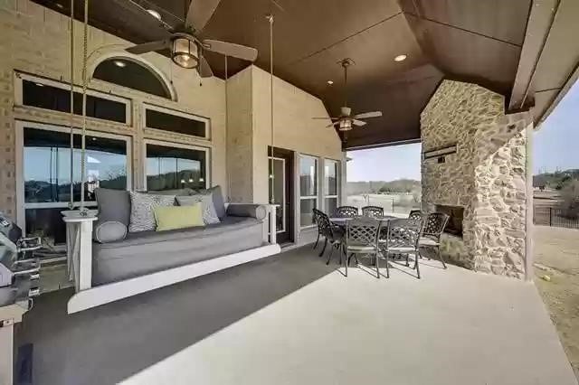 9812 El Colina Dr, Fort Worth, TX 76179 - view of patio with outdoor dining space and a ceiling fan