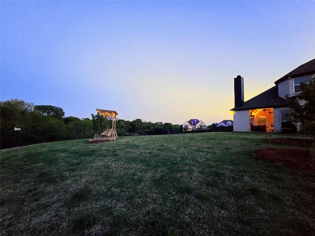 9812 El Colina Dr, Fort Worth, TX 76179 - view of yard at dusk
