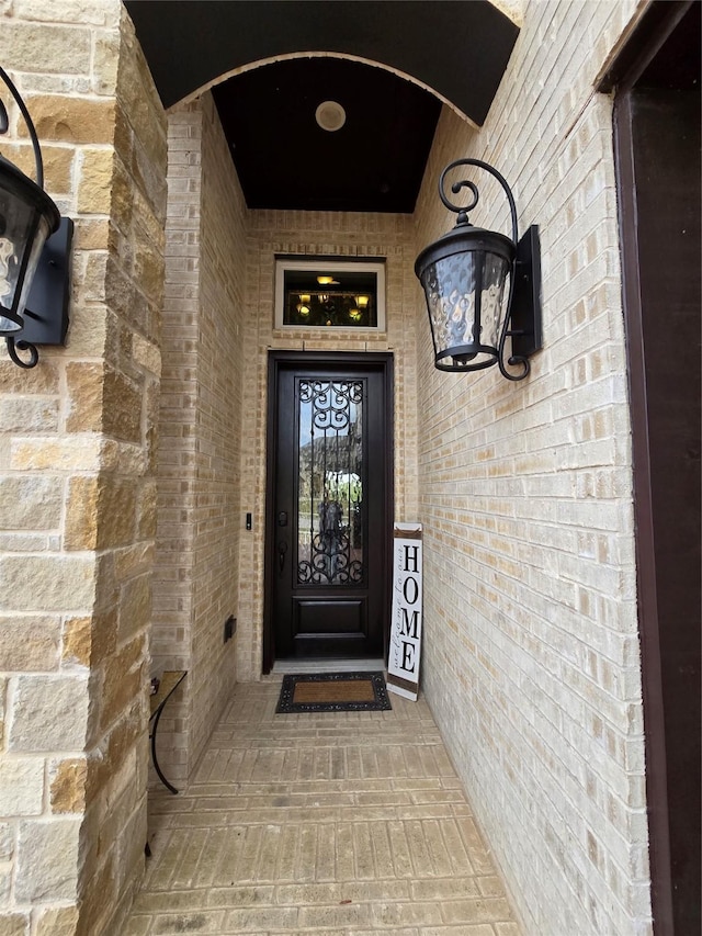 9812 El Colina Dr, Fort Worth, TX 76179 - view of exterior entry featuring brick siding