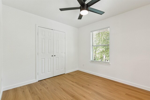 627 N Hampton Rd, Dallas, TX 75208 - empty room with light wood-style flooring and baseboards