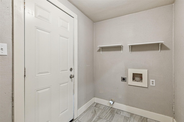 washroom with laundry area, marble finish floor, washer hookup, hookup for an electric dryer, and baseboards