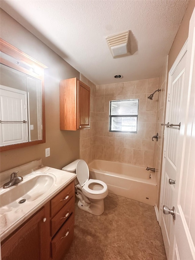 full bath with vanity, shower / tub combination, a textured ceiling, toilet, and visible vents
