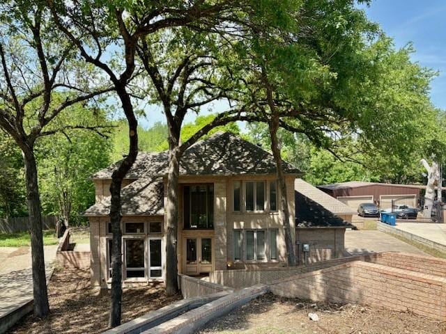 1417 Wyndmere Dr, Desoto, TX 75115 - exterior space with french doors and fence