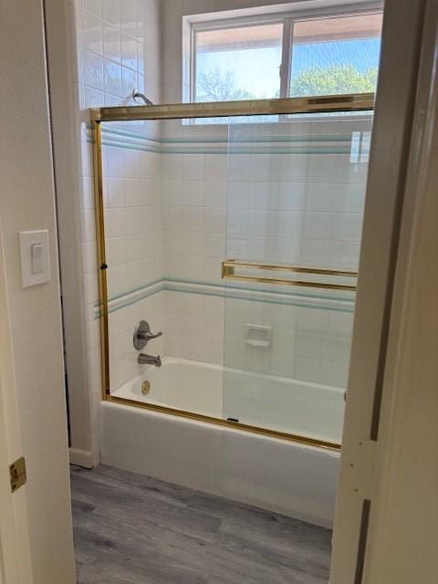 1417 Wyndmere Dr, Desoto, TX 75115 - full bath with wood finished floors and bath / shower combo with glass door