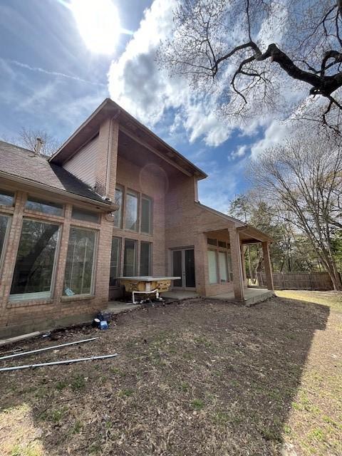 1417 Wyndmere Dr, Desoto, TX 75115 - rear view of property featuring a patio area and french doors